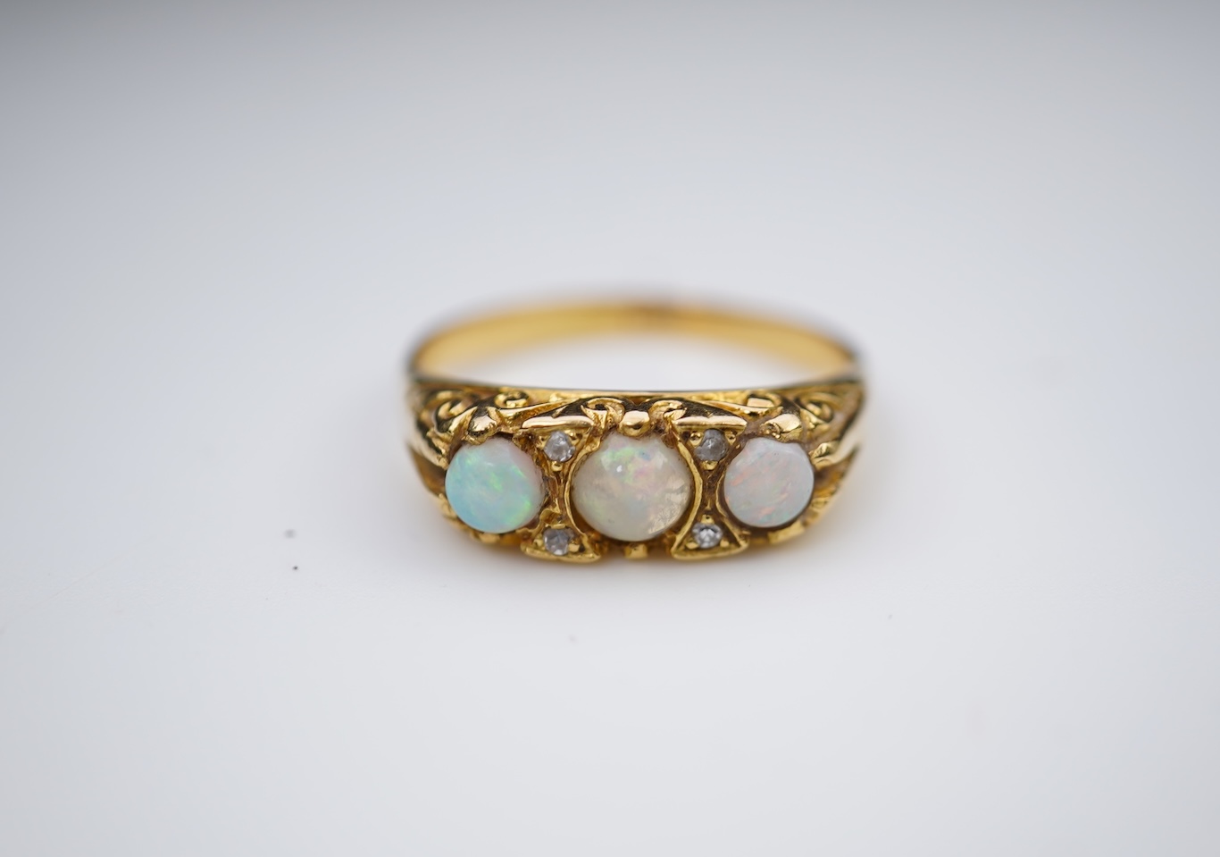 An opal and diamond ring, mid 20th century